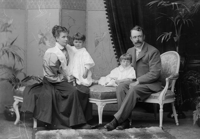 Colin Lunn, his wife and two daughters taken at Post Office terrace c.1896 (Cambridgeshire Collection PCRBLunn