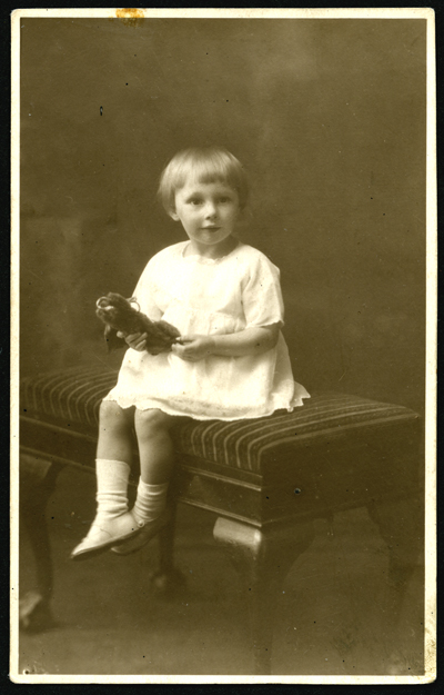 Portrait of girl with soft toy